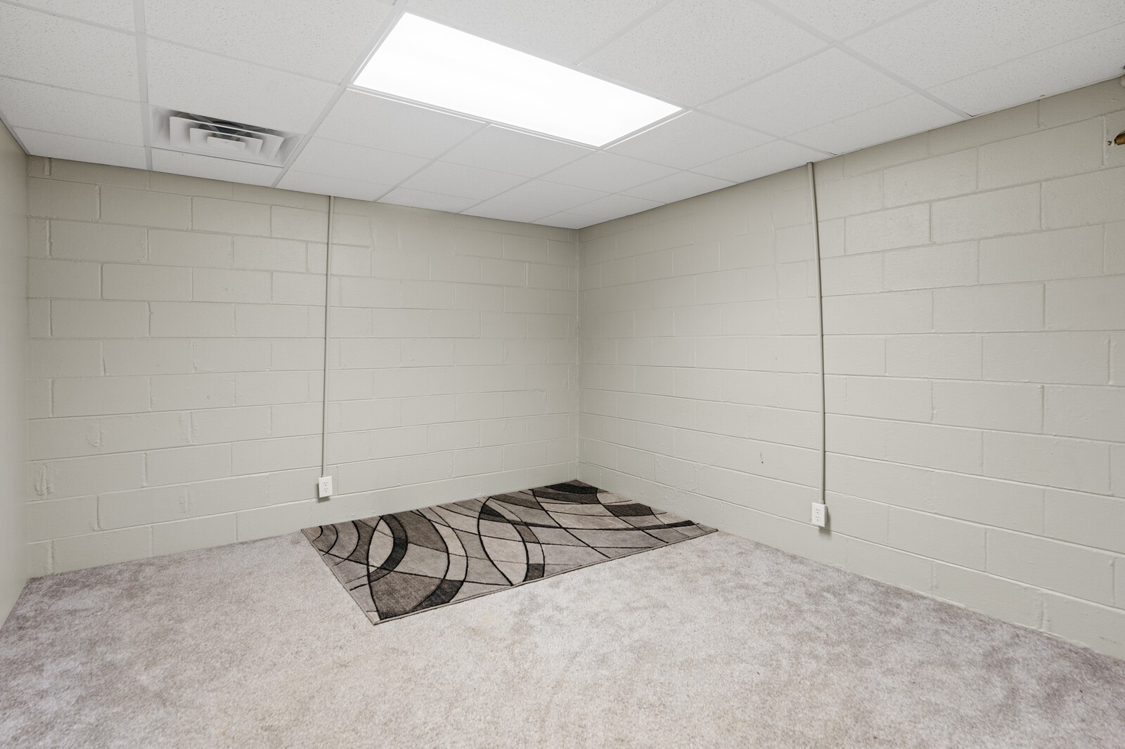 415 Woodruff Road Adams, TN 37010 - Photo 34 of 47 a view of a room with racks on the wall