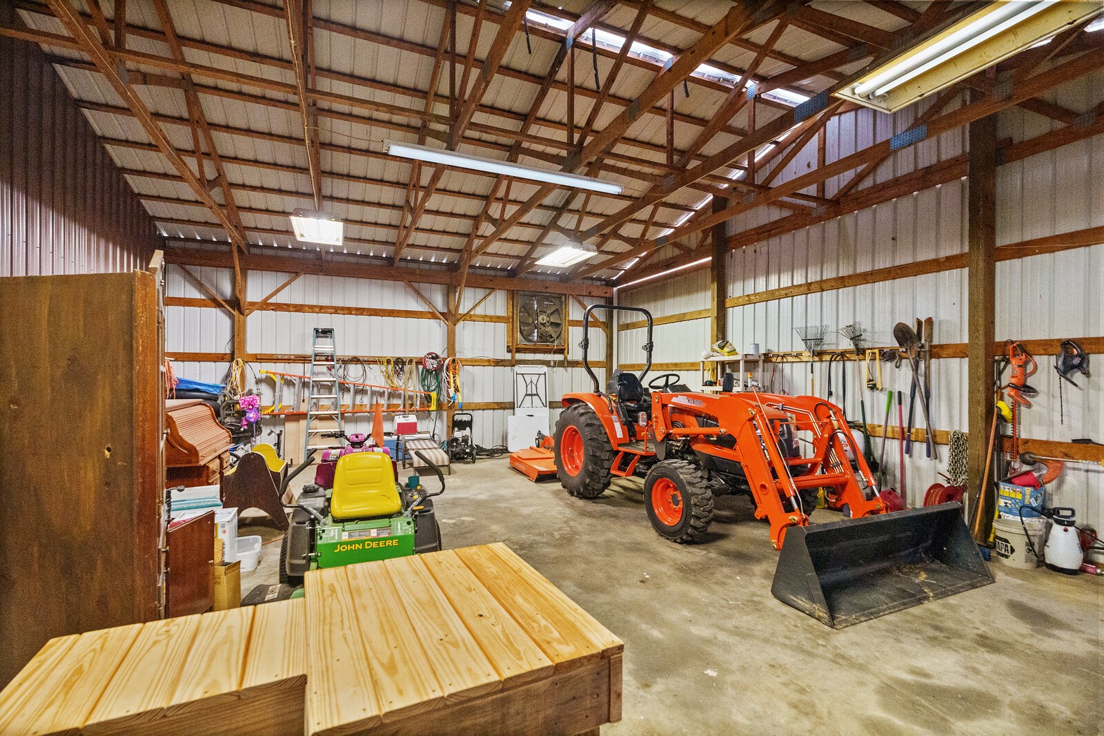 415 Woodruff Road Adams, TN 37010 - Photo 44 of 47 a view of a garage with table and chairs