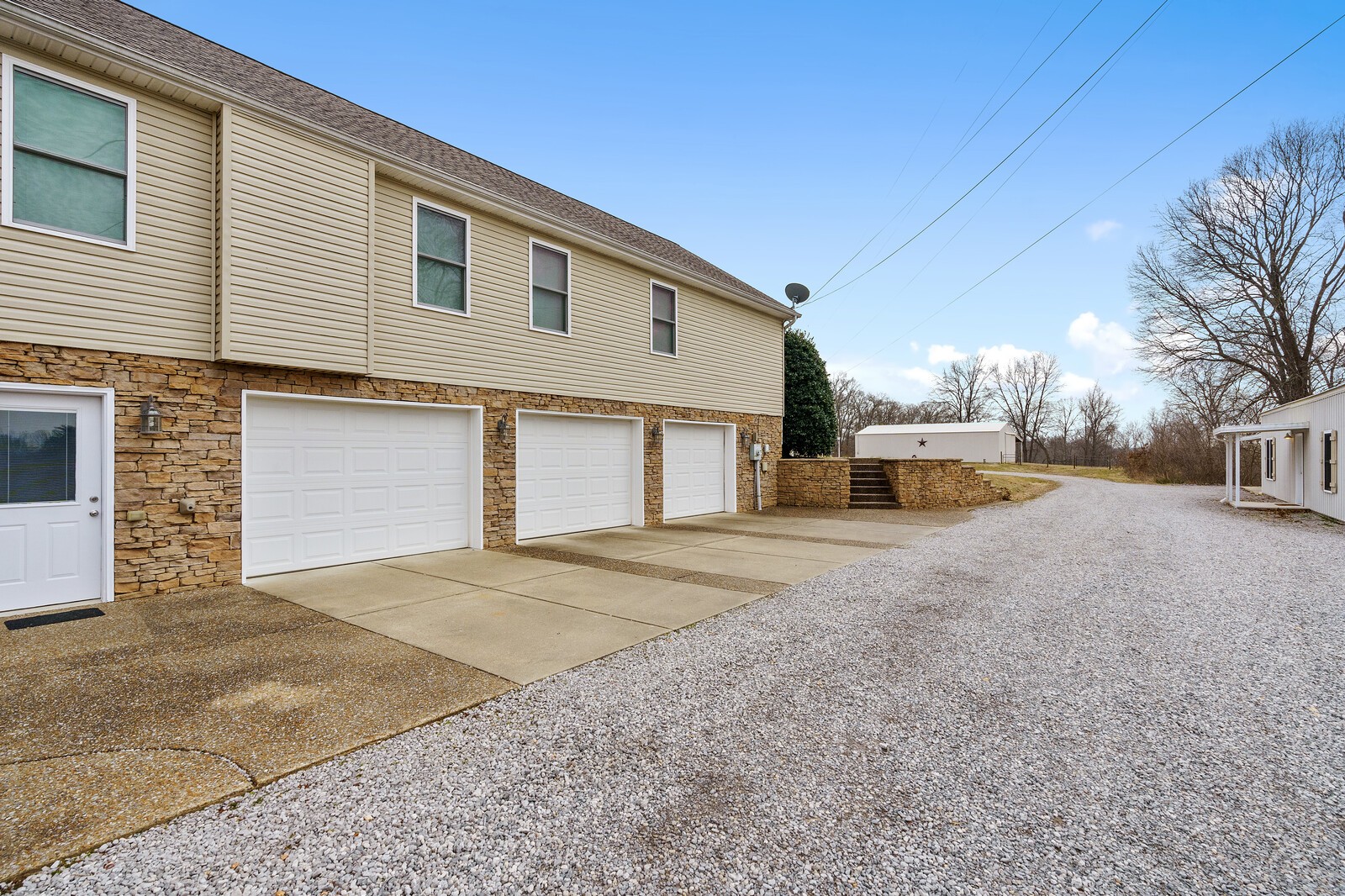415 Woodruff Road Adams, TN 37010 - Photo 6 of 47 a view of a house with a outdoor space