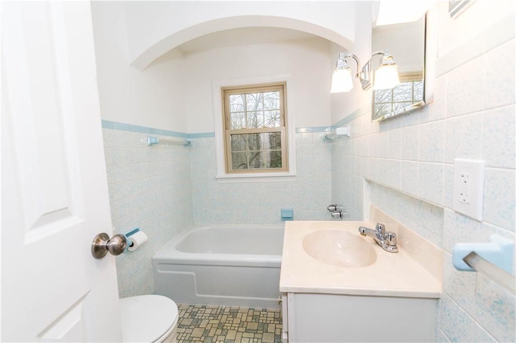 500 Friel Road Baden, PA 15005 - Photo 11 of 24 Adorable first floor, full bath with new mirrors and lights. (A hand-held shower can easily be installed.)