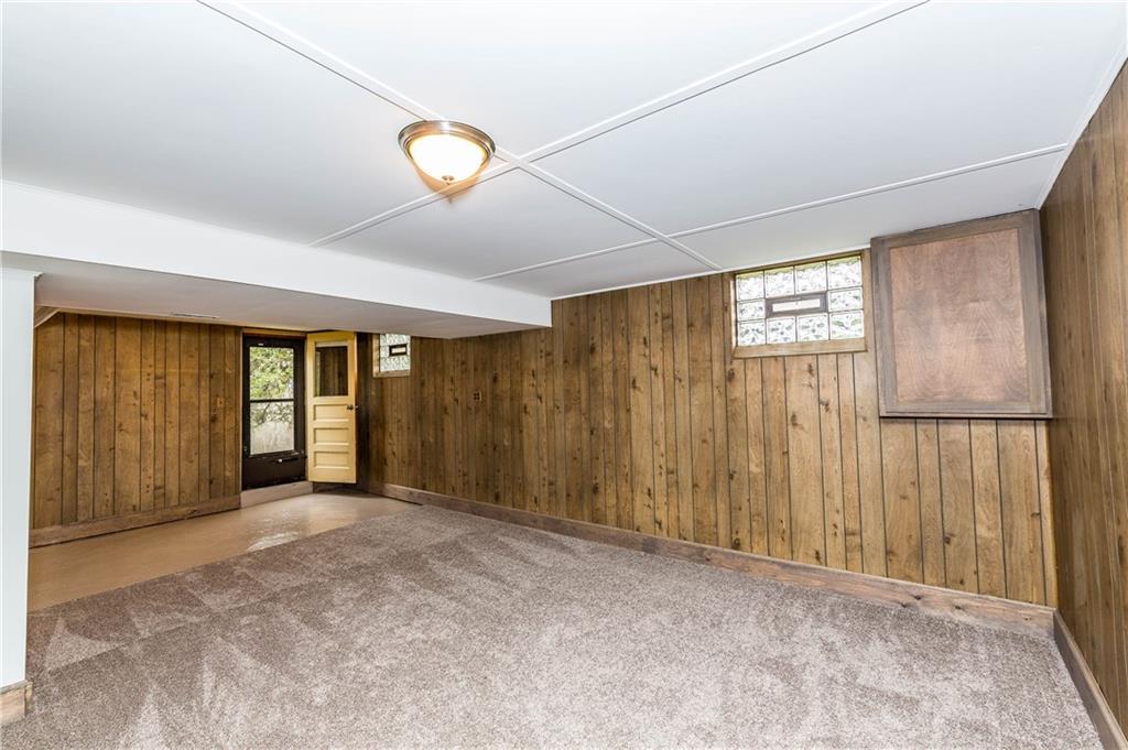 500 Friel Road Baden, PA 15005 - Photo 21 of 24 The whole family will LOVE this massive, finished basement - with convenient walk-out to yard! NEW carpeting, ceiling, and lights.