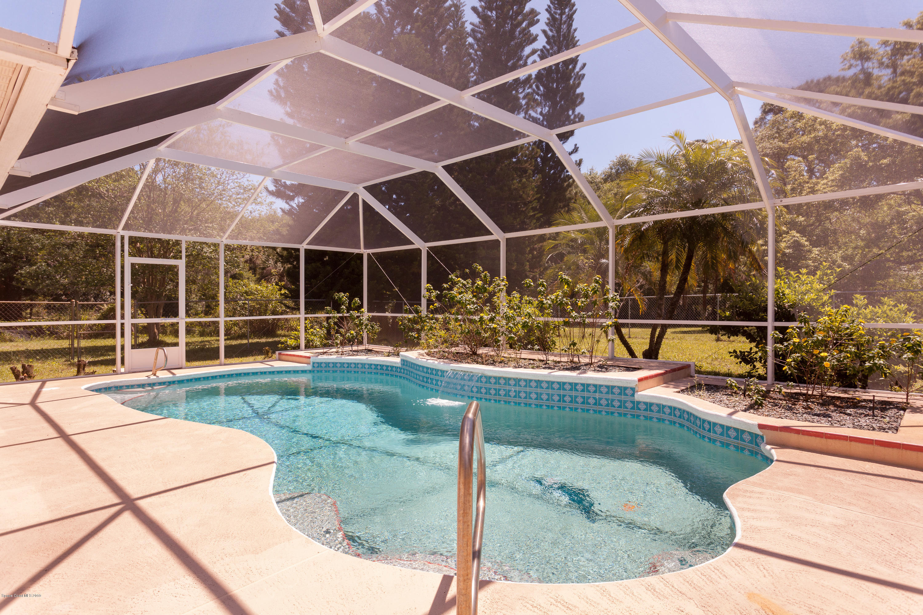 3565 John's Road Mims, FL 32754 - Photo 17 of 21 Pool with waterfall