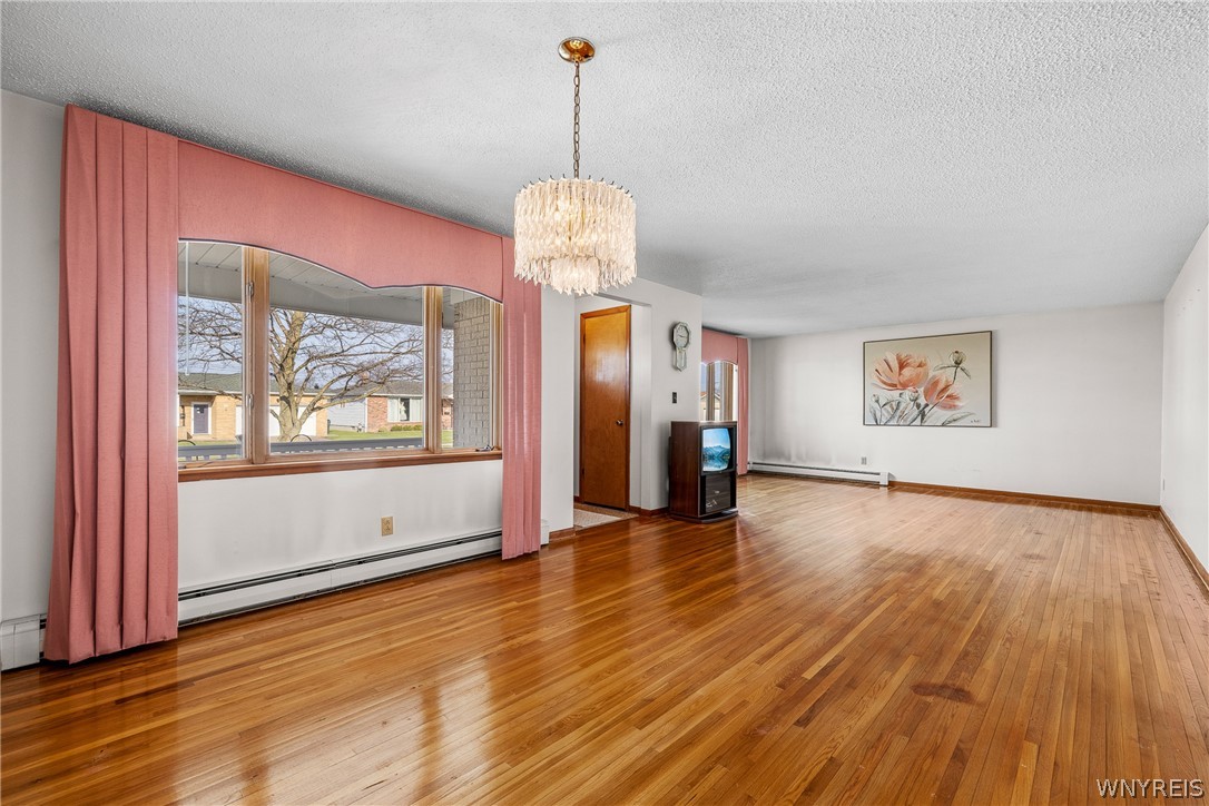39 Cardy Lane Cheektowaga, NY 14043 - Photo 6 of 32 Dining room open to the living room