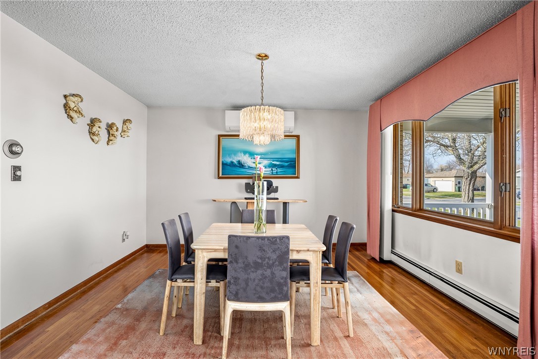 39 Cardy Lane Cheektowaga, NY 14043 - Photo 7 of 32 Dining room virtually staged