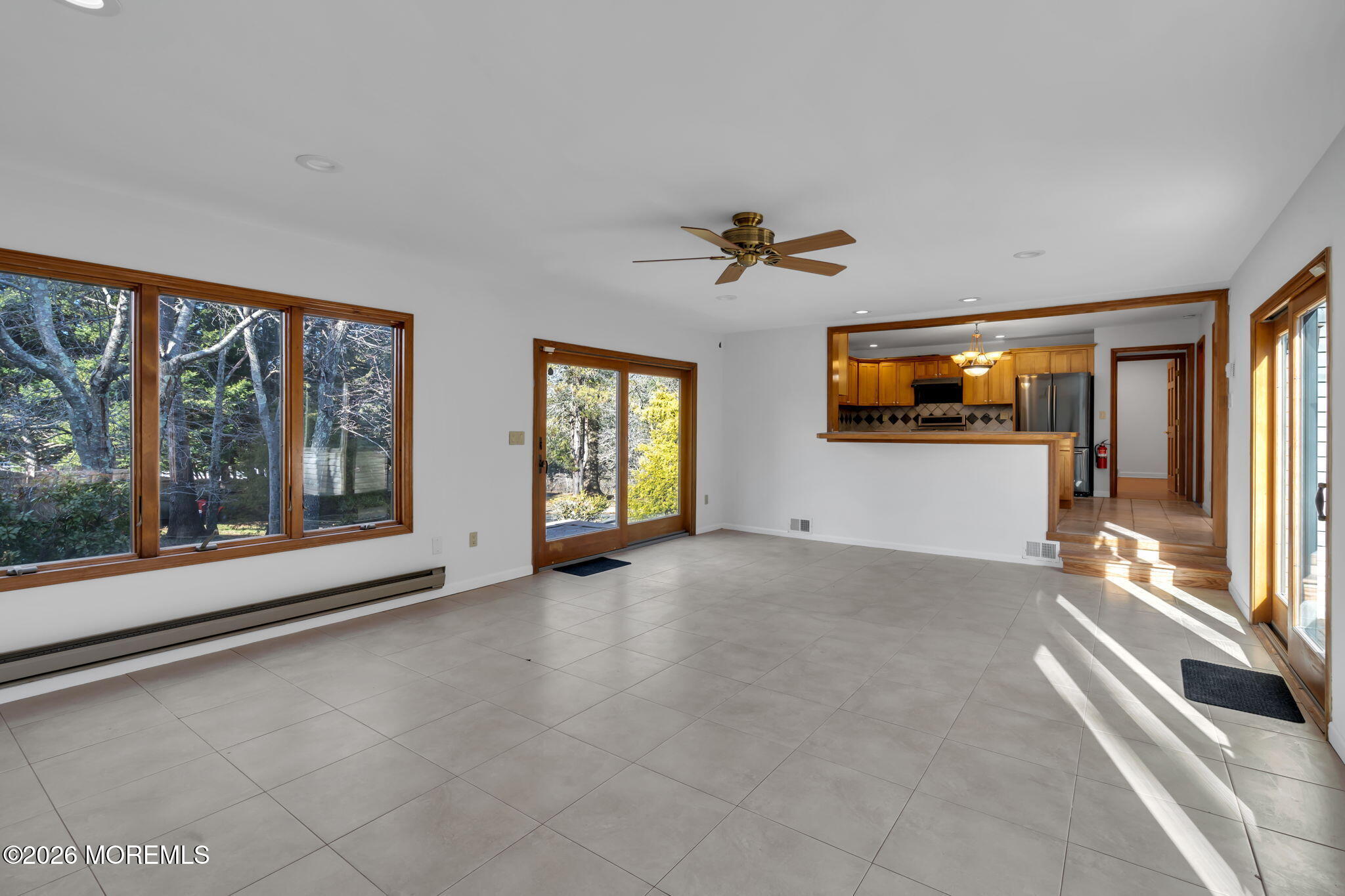 53 Montrose Road Colts Neck, NJ 07722 - Photo 17 of 43 a view of an empty room with a window and fire place