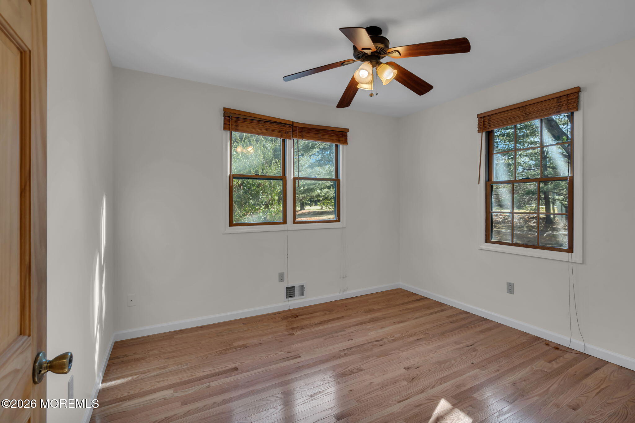 53 Montrose Road Colts Neck, NJ 07722 - Photo 21 of 43 a view of empty room with wooden floor and fan
