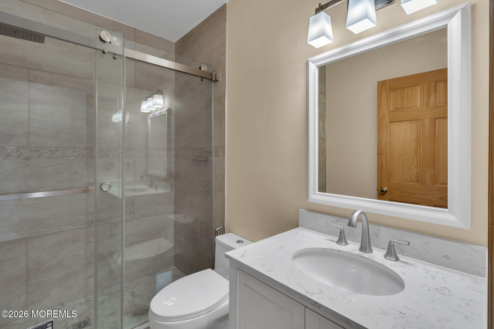 53 Montrose Road Colts Neck, NJ 07722 - Photo 23 of 43 a bathroom with a sink toilet and shower