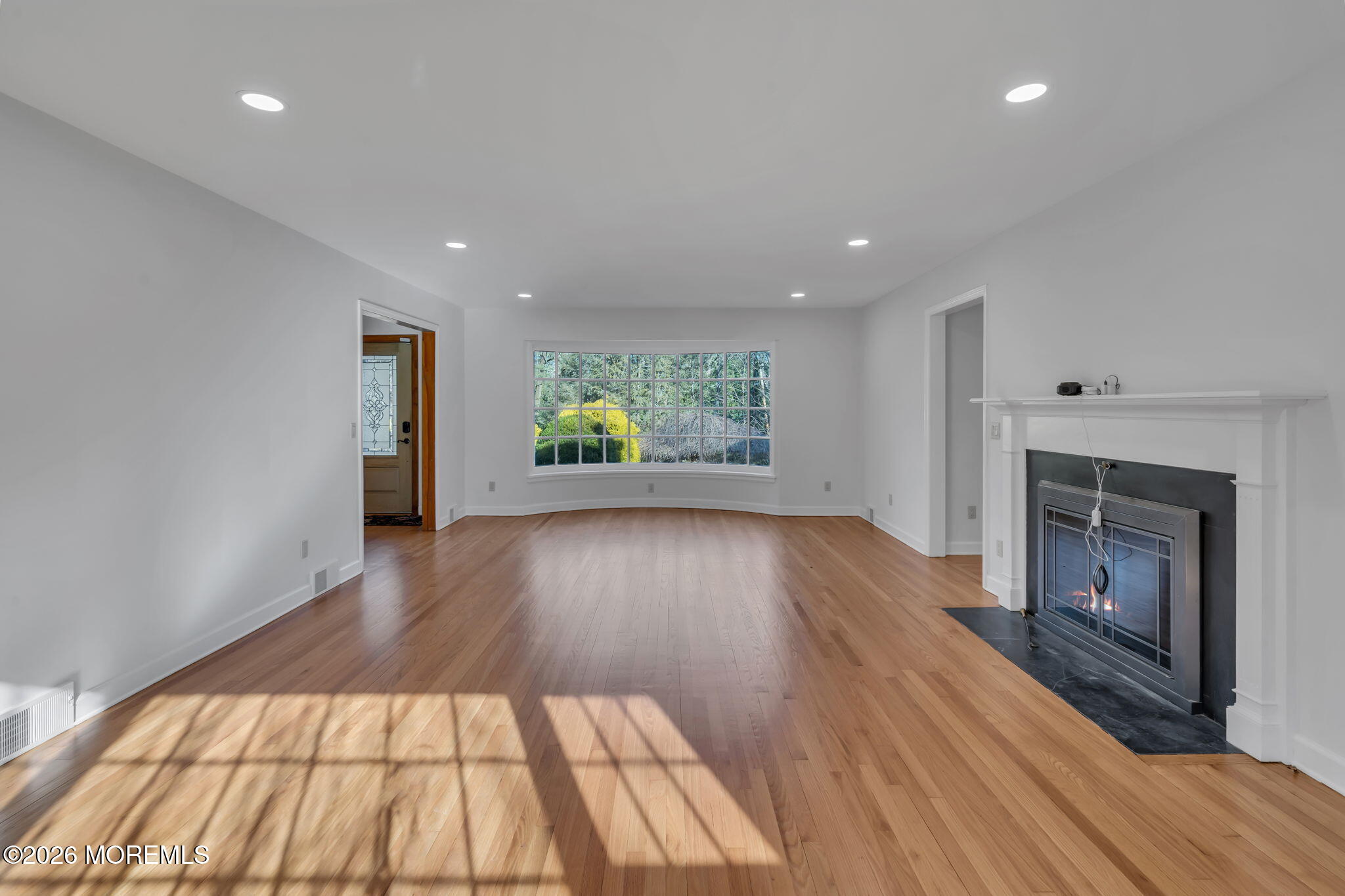 53 Montrose Road Colts Neck, NJ 07722 - Photo 4 of 43 a view of an empty room and a fireplace