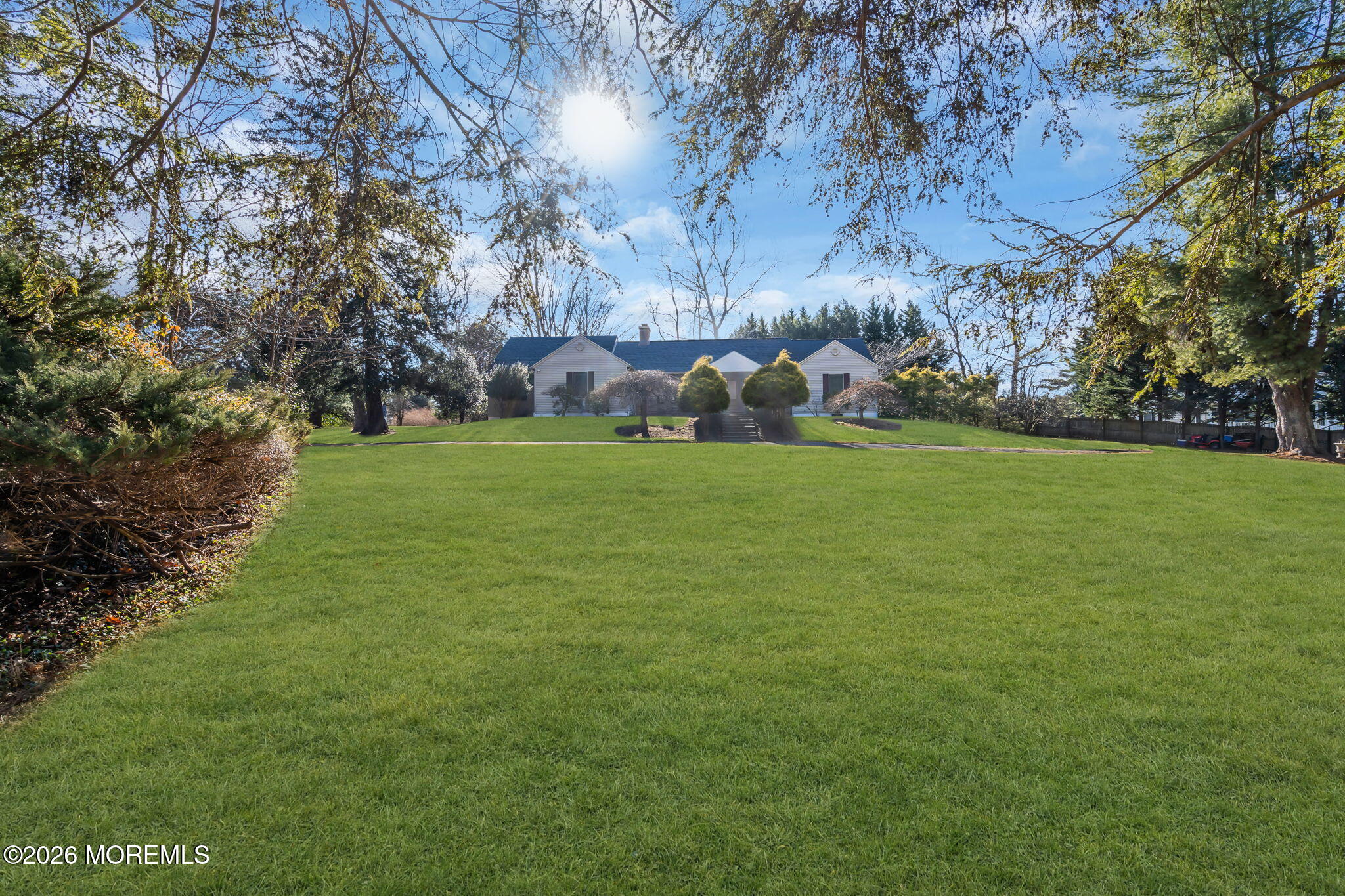 53 Montrose Road Colts Neck, NJ 07722 - Photo 43 of 43 a backyard of a house with lots of green space