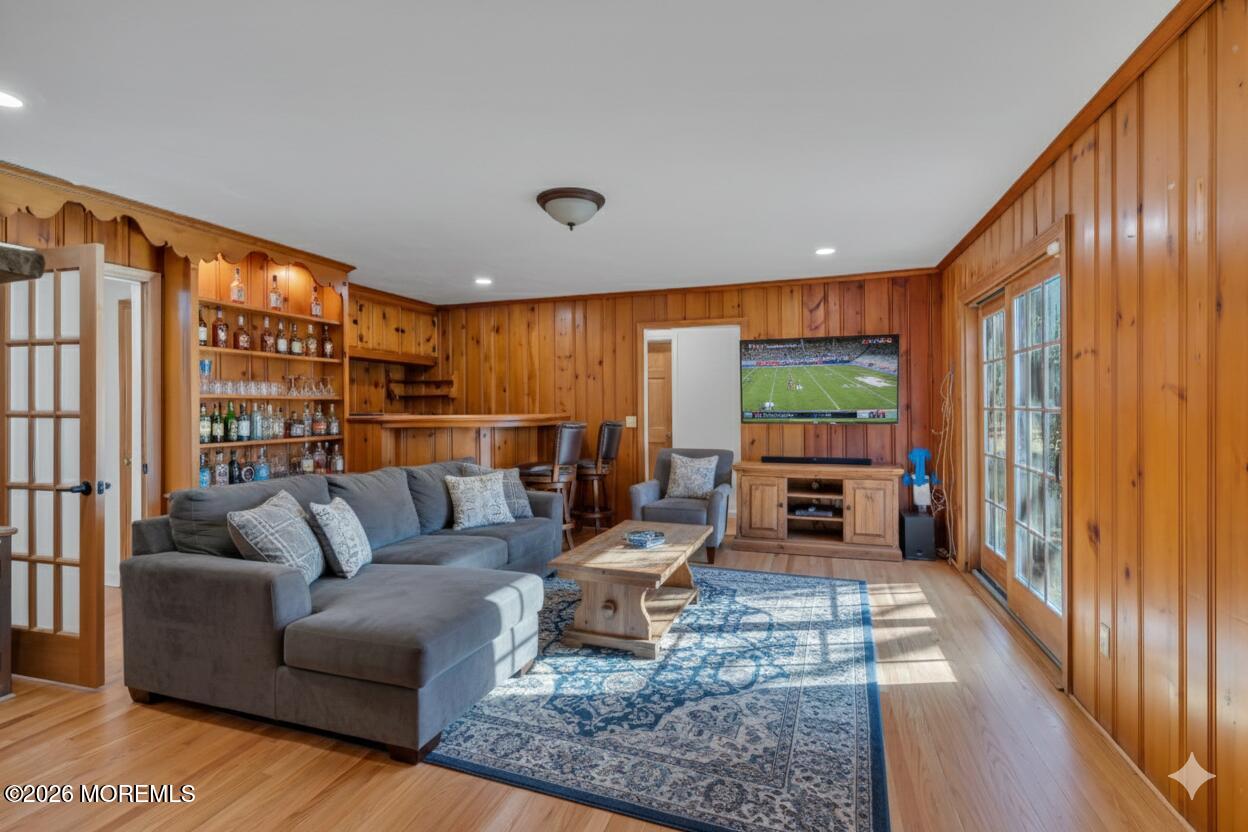 53 Montrose Road Colts Neck, NJ 07722 - Photo 7 of 43 a living room with furniture and a flat screen tv