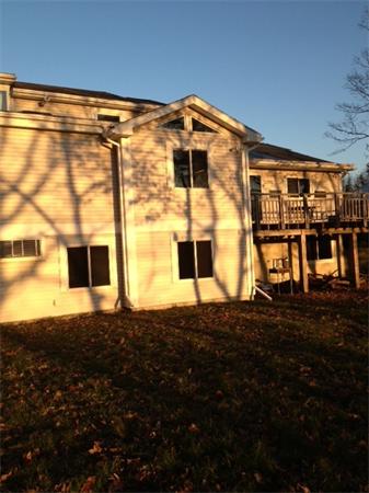 38 Harwood Road Natick, MA 01760 - Photo 3 of 8 a view of a big room with windows