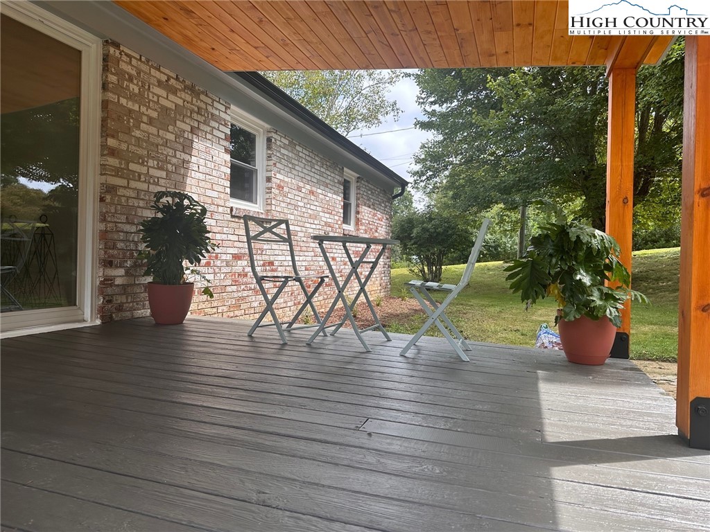 410 Cook Street Jefferson, NC 28640 - Photo 14 of 16 a view of a terrace with seating space