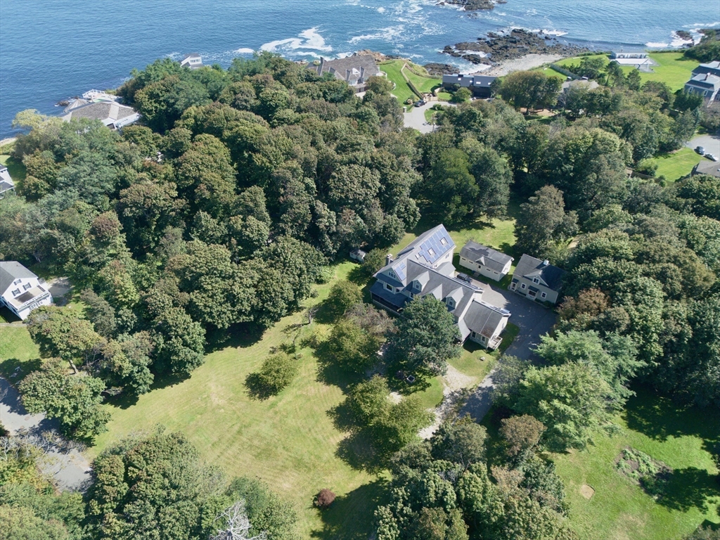 25 Pleasant Street Nahant, MA 01908 - Photo 1 of 39 an aerial view of a house with a yard