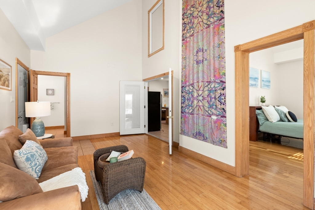 25 Pleasant Street Nahant, MA 01908 - Photo 15 of 39 a living room with furniture and a fireplace