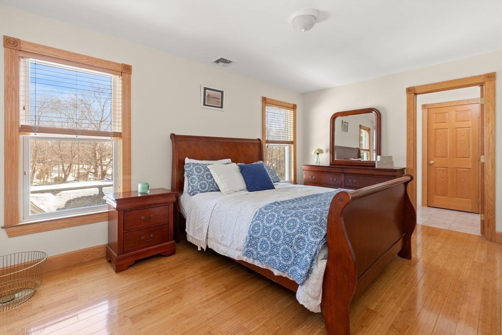 25 Pleasant Street Nahant, MA 01908 - Photo 18 of 39 a bedroom with a bed and a window