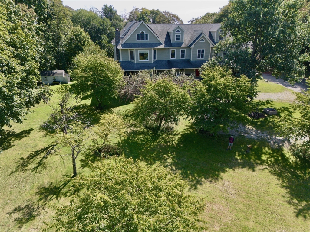 25 Pleasant Street Nahant, MA 01908 - Photo 2 of 39 a house view with a garden space