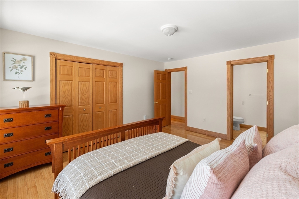 25 Pleasant Street Nahant, MA 01908 - Photo 21 of 39 a bedroom with a bed and a dresser