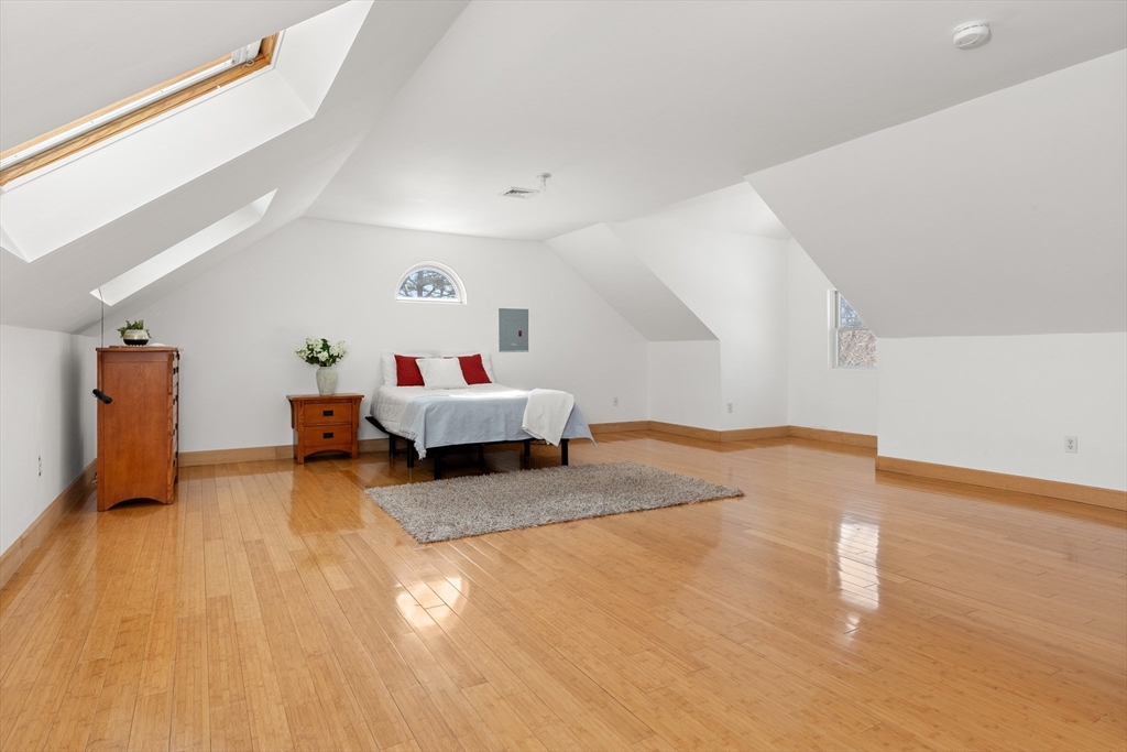 25 Pleasant Street Nahant, MA 01908 - Photo 34 of 39 a living room with furniture and a flat screen tv
