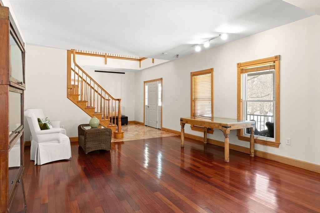25 Pleasant Street Nahant, MA 01908 - Photo 4 of 39 a living room with furniture and a wooden floor