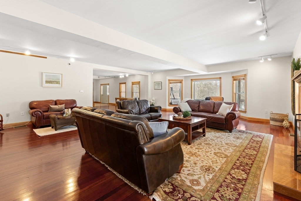 25 Pleasant Street Nahant, MA 01908 - Photo 9 of 39 a living room with furniture and wooden floor