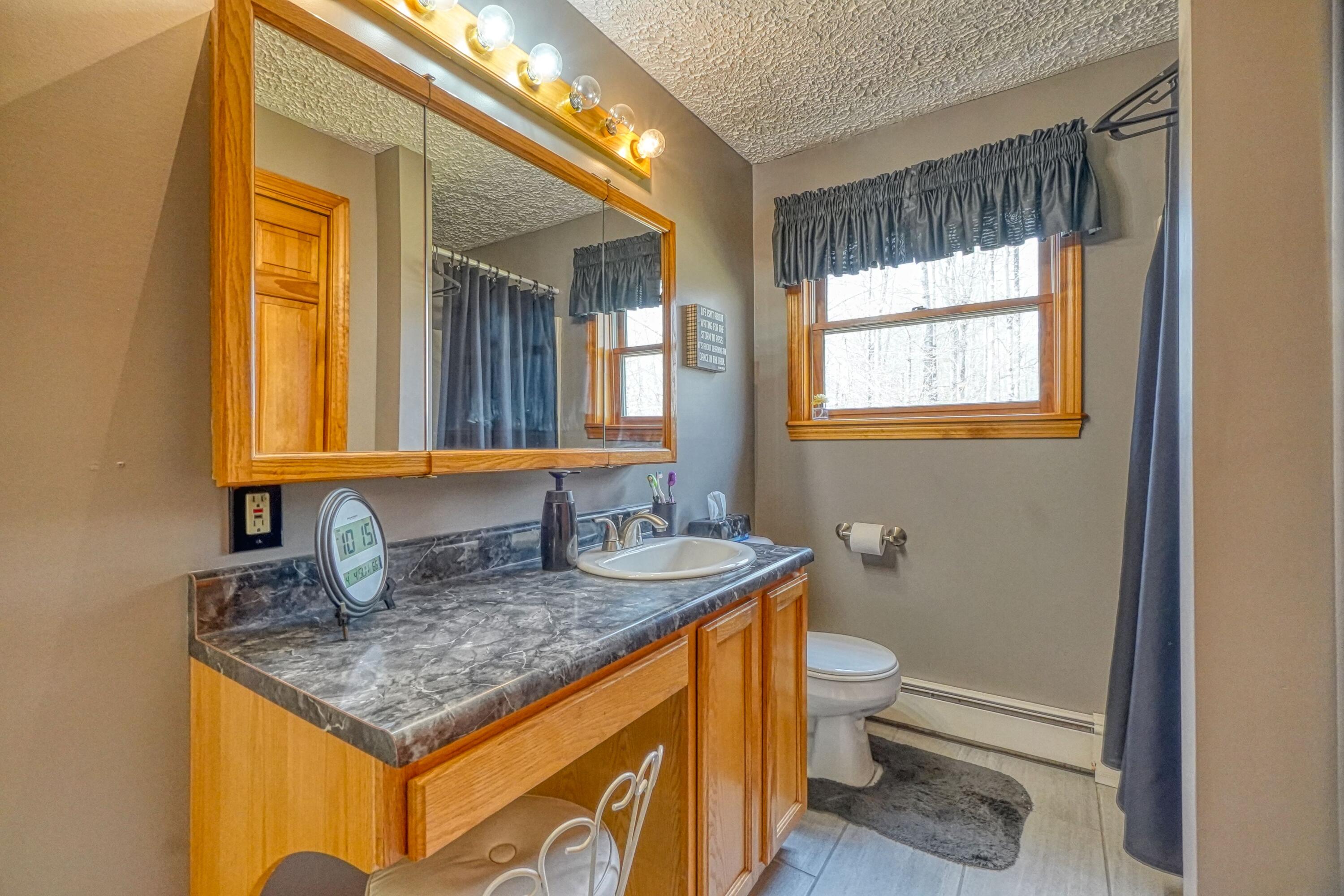 214 Windsor Road Chelsea, ME 04330 - Photo 17 of 42 First level bath