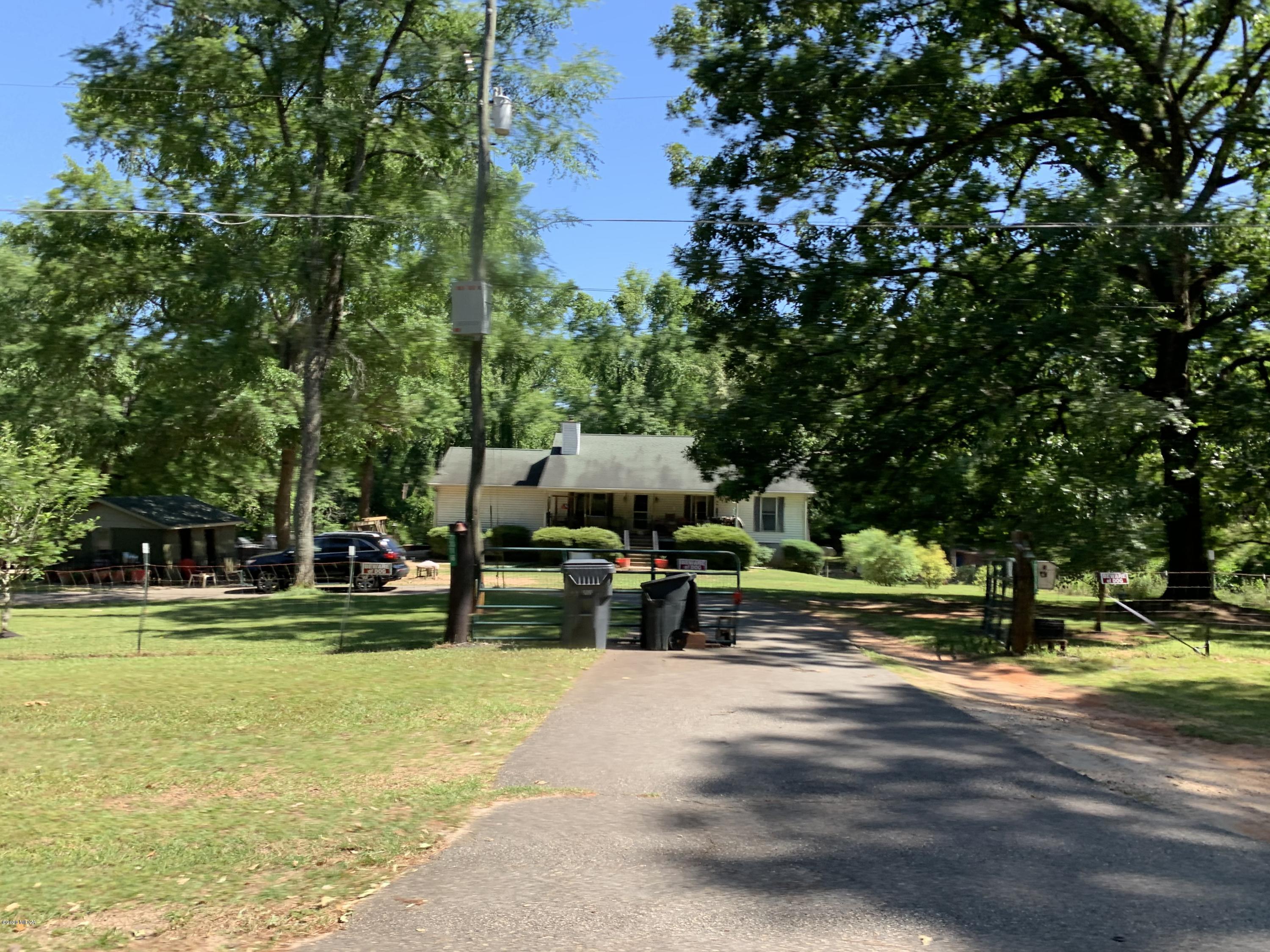 7316 Colaparchee Road Macon, GA 31220 - Photo 2 of 13 a view of a park with large trees