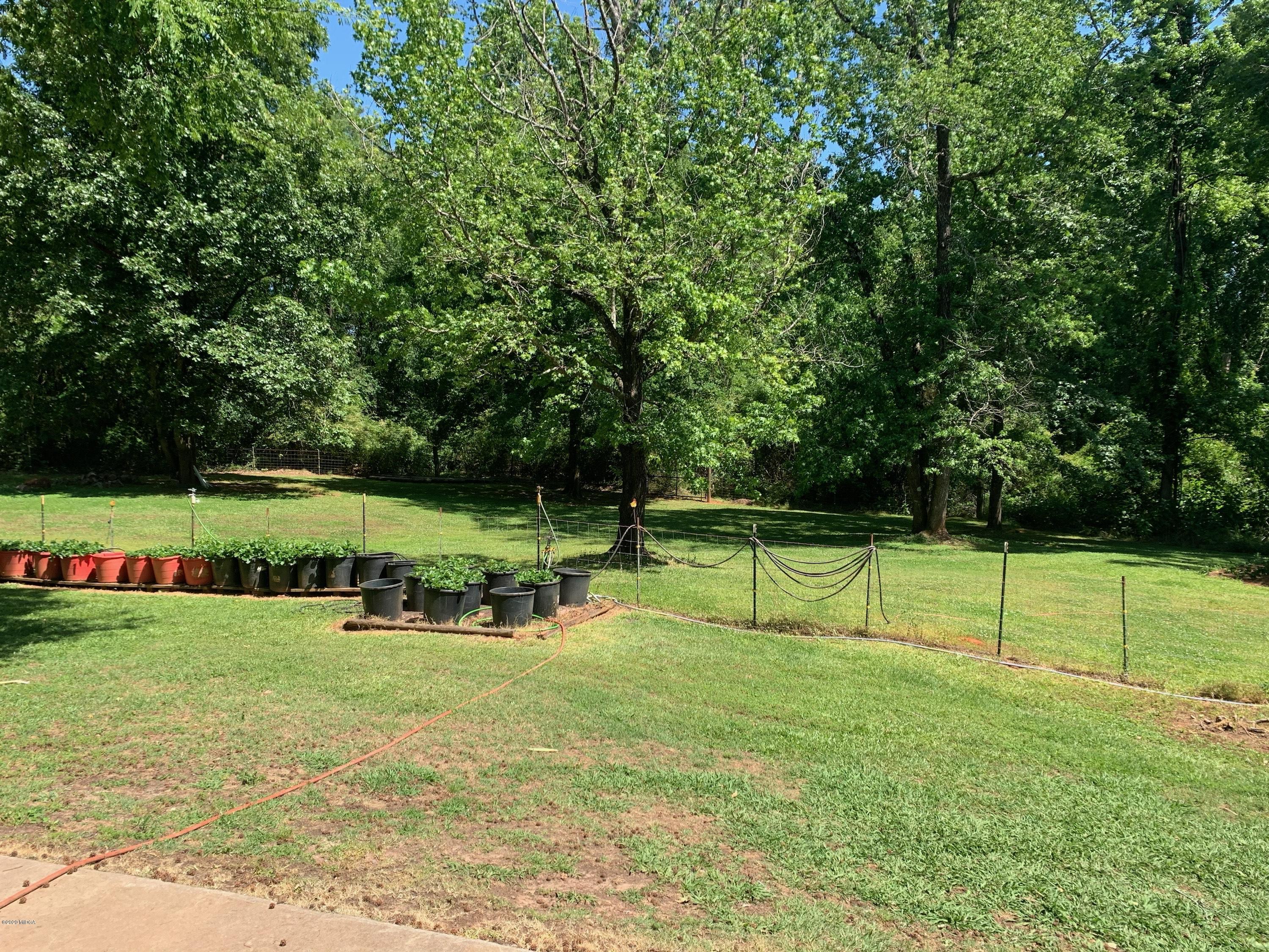 7316 Colaparchee Road Macon, GA 31220 - Photo 13 of 13 a view of a park with swings and slides