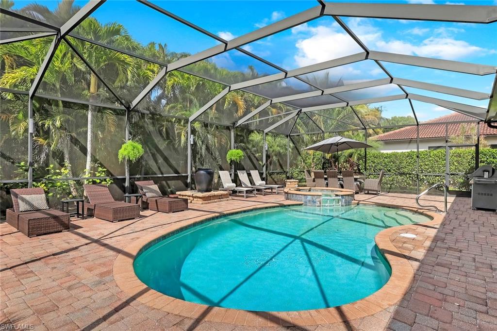 3783 Treasure Cove Circle Naples, FL 34114 - Photo 31 of 43 a view of a swimming pool with a patio