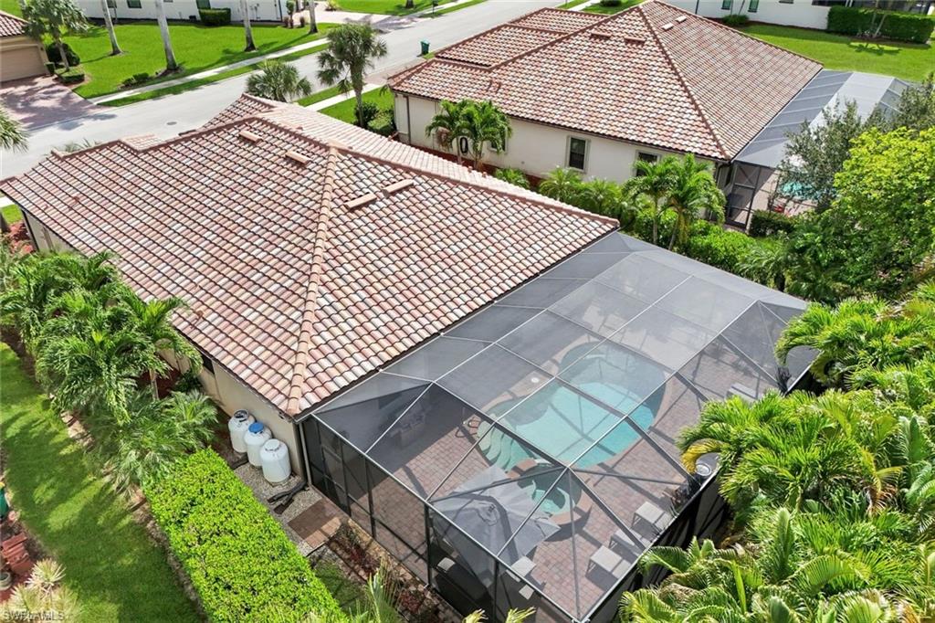 3783 Treasure Cove Circle Naples, FL 34114 - Photo 40 of 43 an aerial view of a house with a yard and potted plants