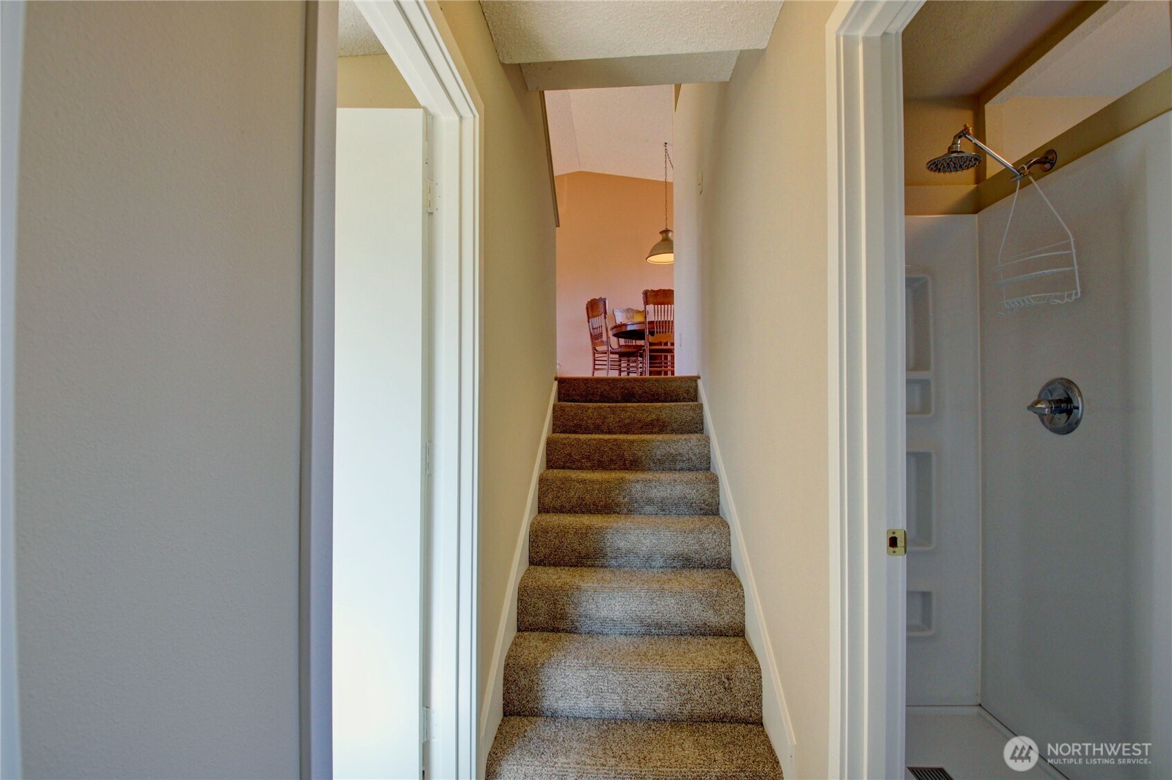1214 36th Street Anacortes, WA 98221 - Photo 12 of 35 a view of a hallway with a door and stairs