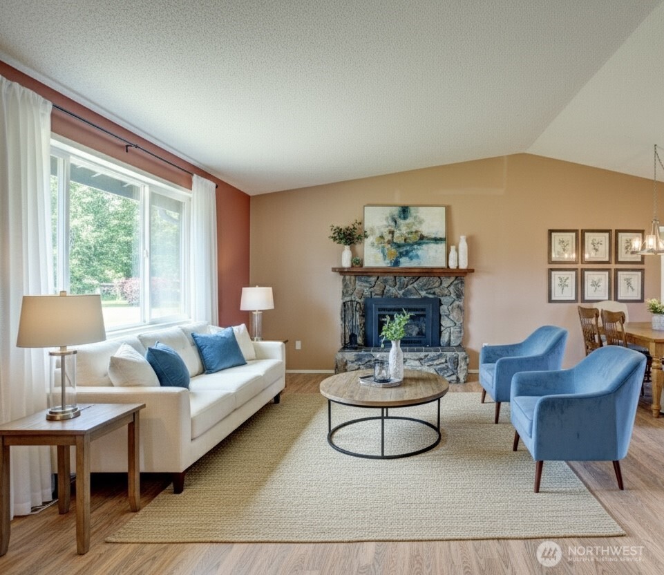 1214 36th Street Anacortes, WA 98221 - Photo 19 of 35 a living room with furniture and a large window