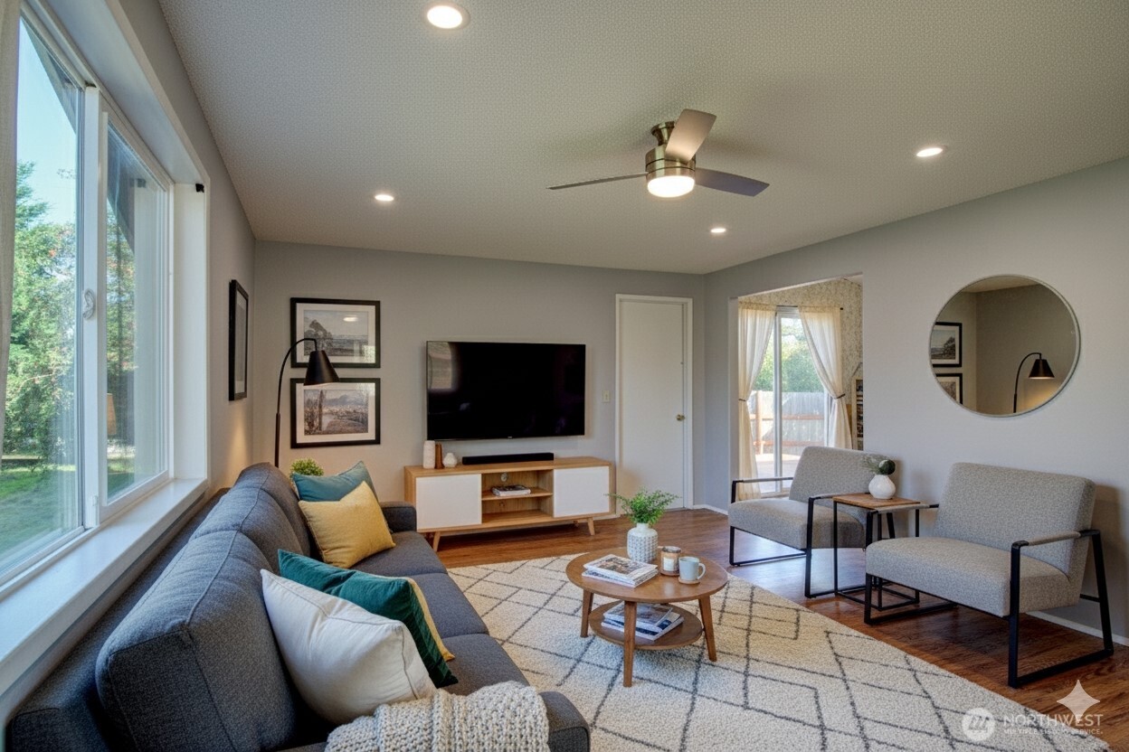 1214 36th Street Anacortes, WA 98221 - Photo 9 of 35 a living room with furniture and a flat screen tv