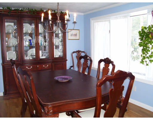 21 Cider Mill Road Framingham, MA 01701 - Photo 3 of 22 a view of a dining room with furniture and window
