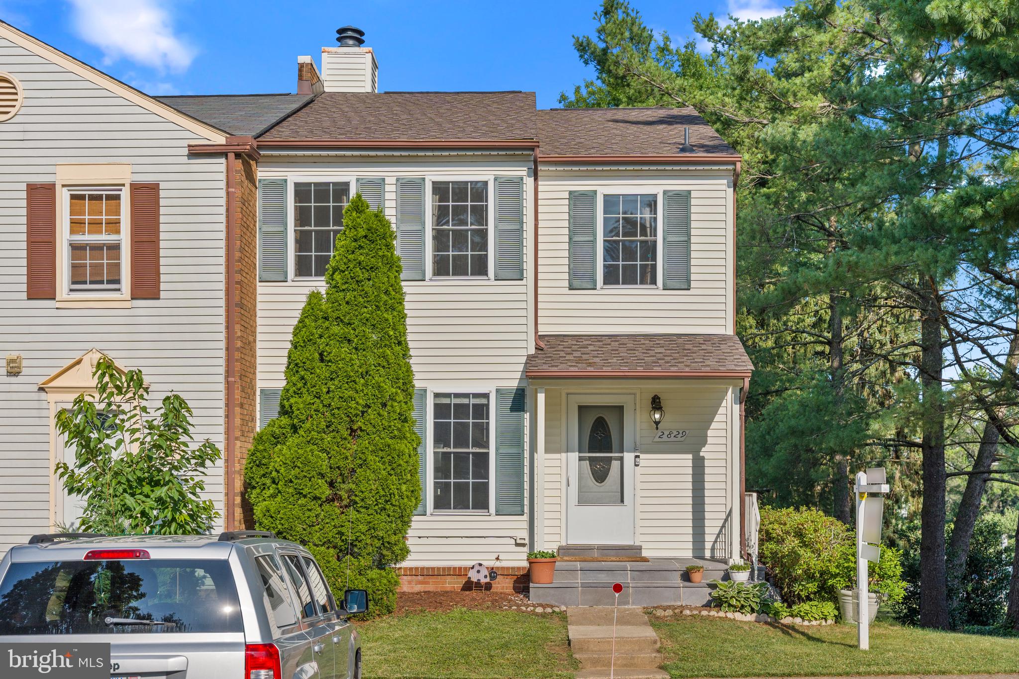 2829 Grovemore Lane Vienna, VA 22180 - Photo 16 of 42 Charming townhouse with lush greenery.