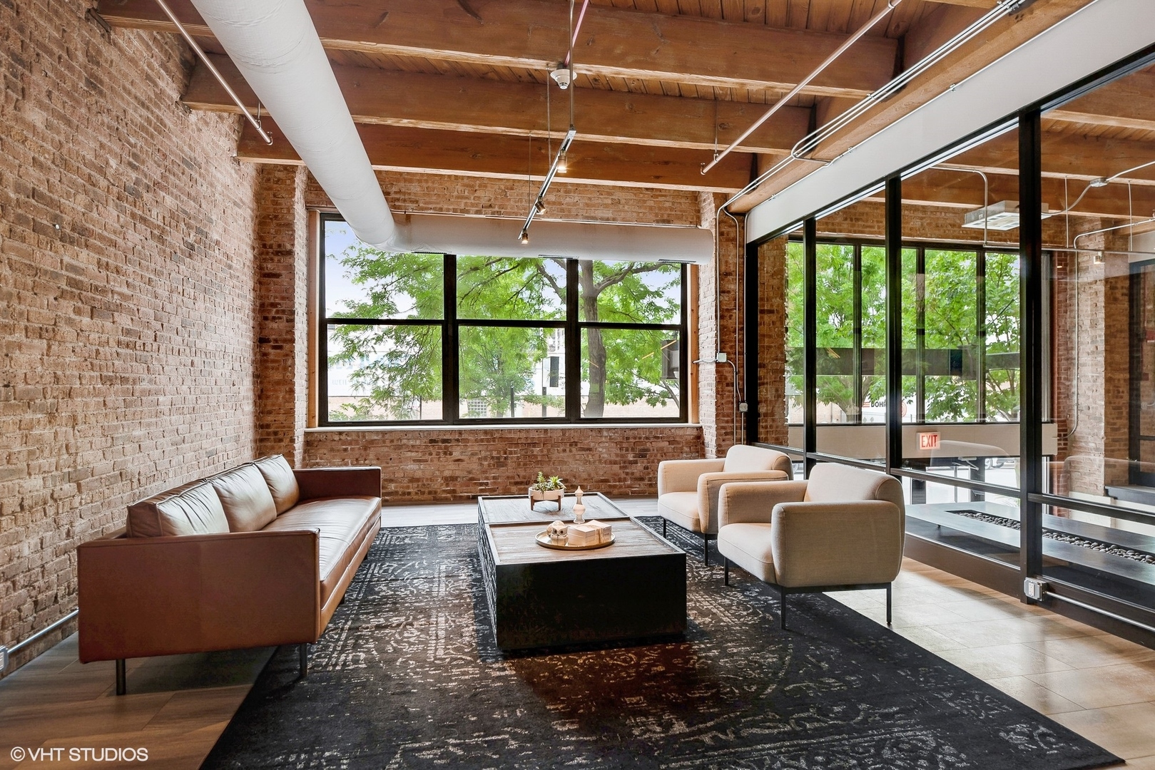 1040 West Adams Street, Unit 428 Chicago, IL 60607 - Photo 3 of 28 a living room with furniture and a large window
