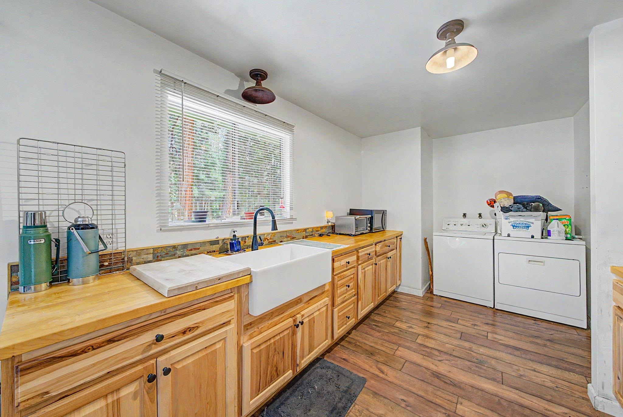 58374 Gill Ranch Road Cromberg, CA 96103 - Photo 25 of 44 a large white kitchen with a large window