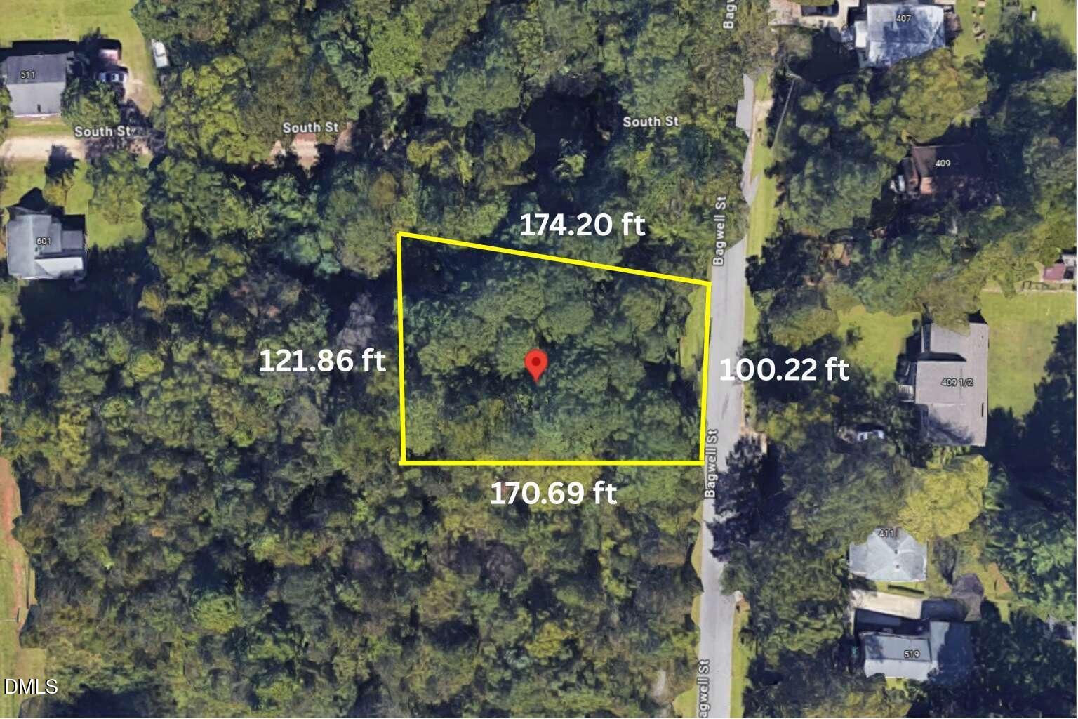 0 Bagwell Street Garner, NC 27529 - Photo 2 of 5 a sign that is sitting on a tree