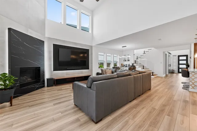 a kitchen with stainless steel appliances a sink stove and cabinets