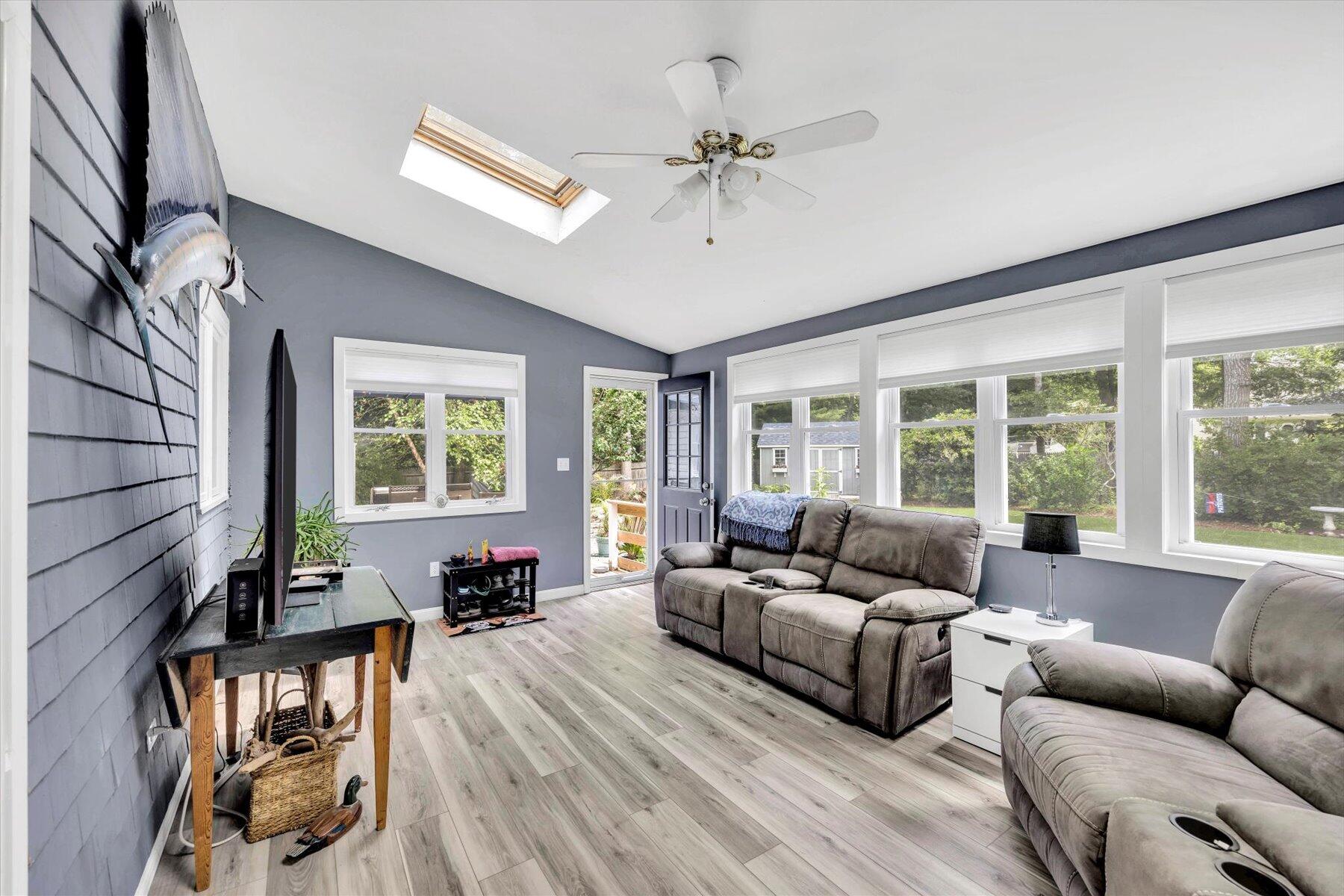 30 Guildford Road Centerville, MA 02632 - Photo 22 of 42 a living room with furniture and a large window