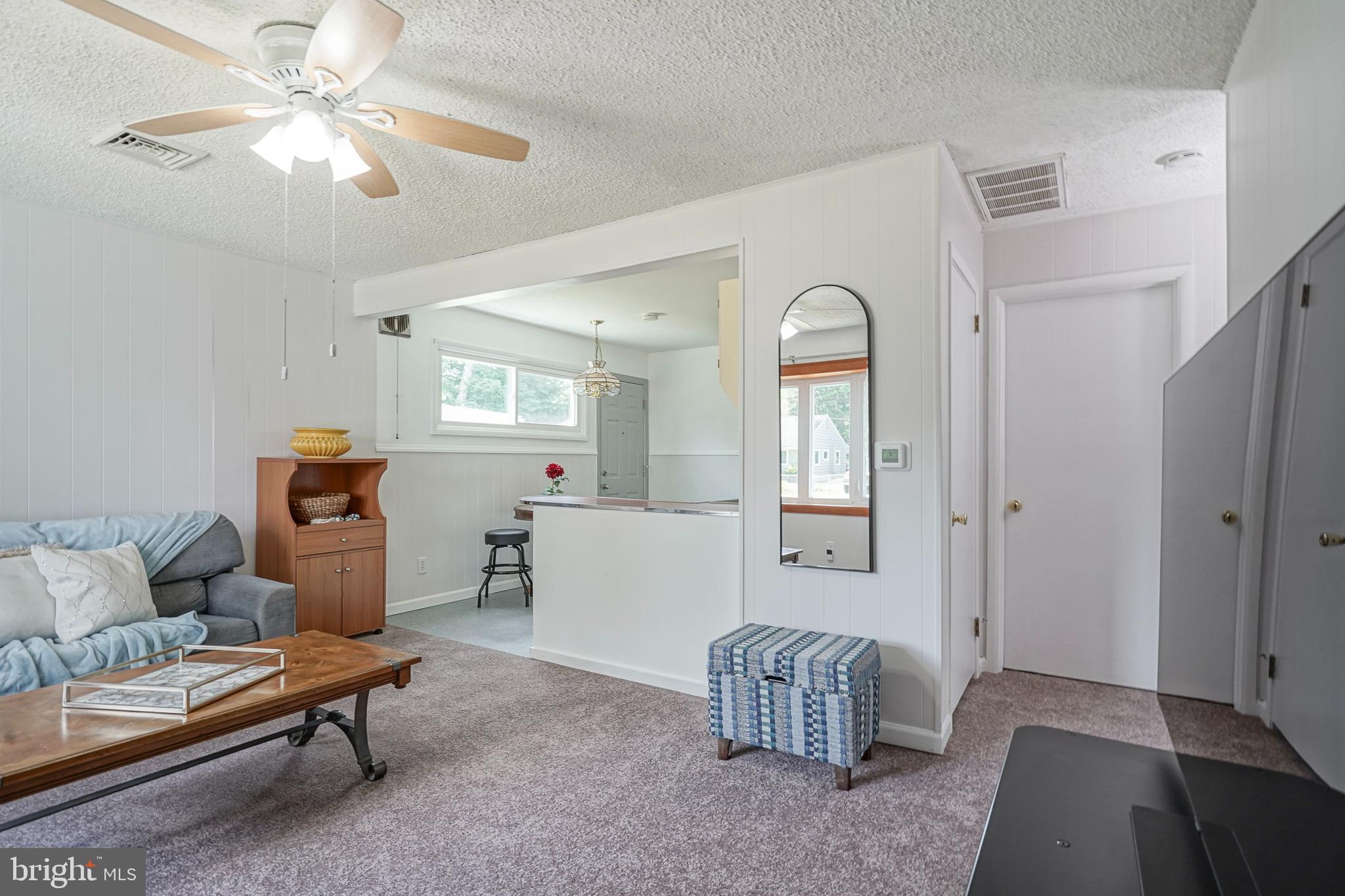 419 Ruth Avenue Maple Shade, NJ 08052 - Photo 11 of 28 a living room with furniture and a window