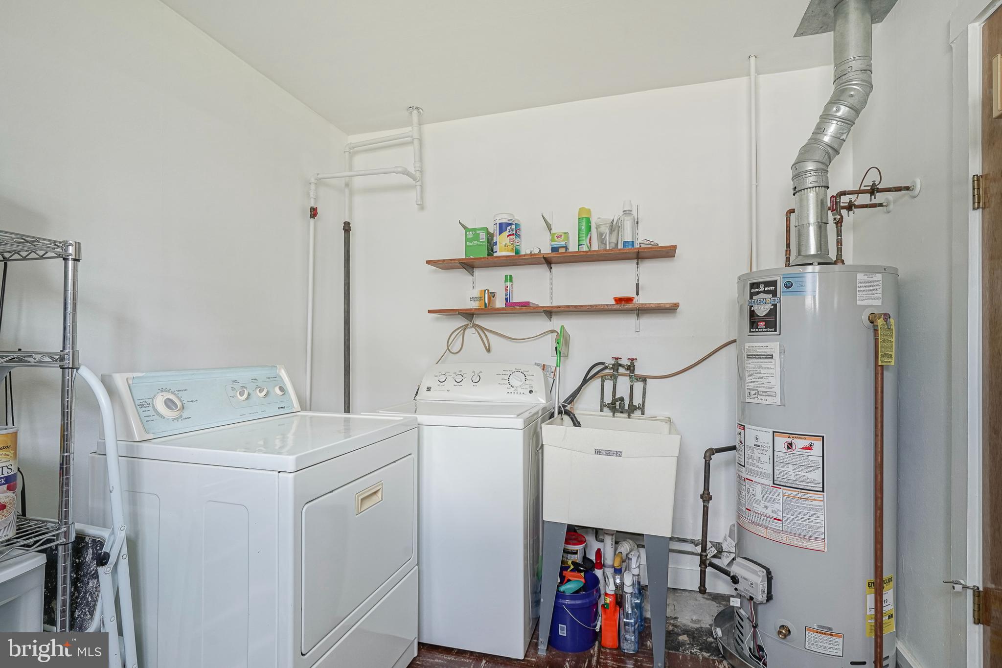 419 Ruth Avenue Maple Shade, NJ 08052 - Photo 25 of 28 a utility room with dryer and washer
