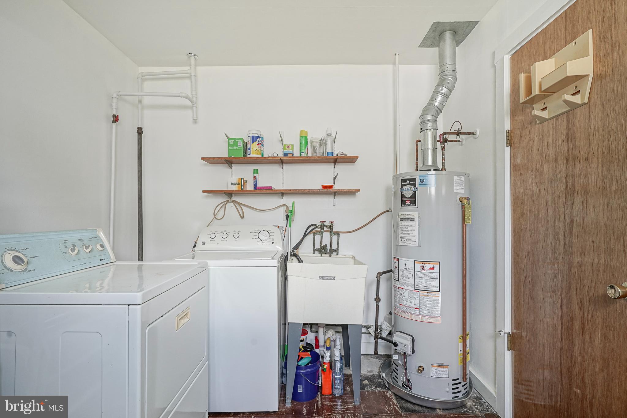 419 Ruth Avenue Maple Shade, NJ 08052 - Photo 26 of 28 a view of storage and utility room with washer and dryer