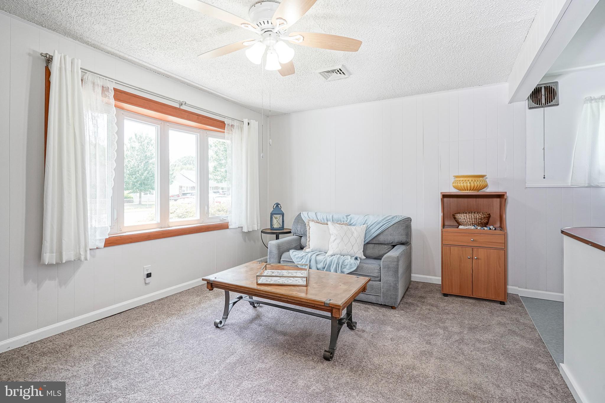 419 Ruth Avenue Maple Shade, NJ 08052 - Photo 9 of 28 a living room with furniture and a window