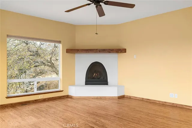 a spacious bathroom with a double vanity sink a mirror and a bathtub