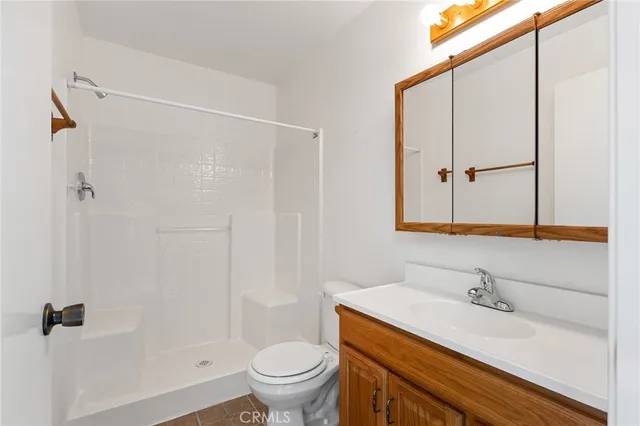 an aerial view of residential building and trees