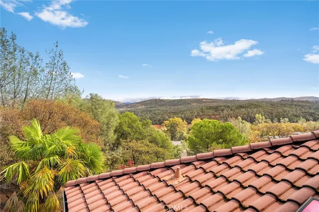 an aerial view of a city with lots of residential buildings