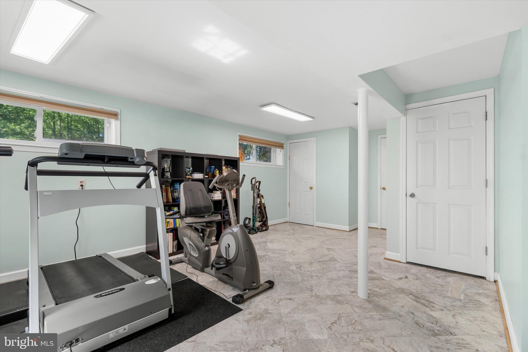 8304 Harland Drive Springfield, VA 22152 - Photo 31 of 39 a view of a room with gym equipment