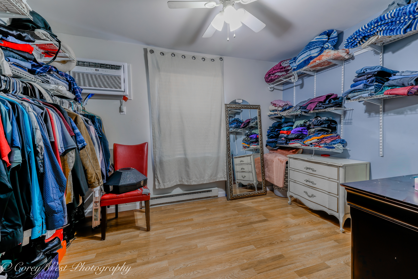 607 North 9th Street DeKalb, IL 60115 - Photo 11 of 14 a view of walk in closet with clothes and shoes