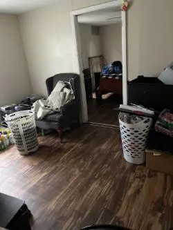 a bedroom with bed and a window