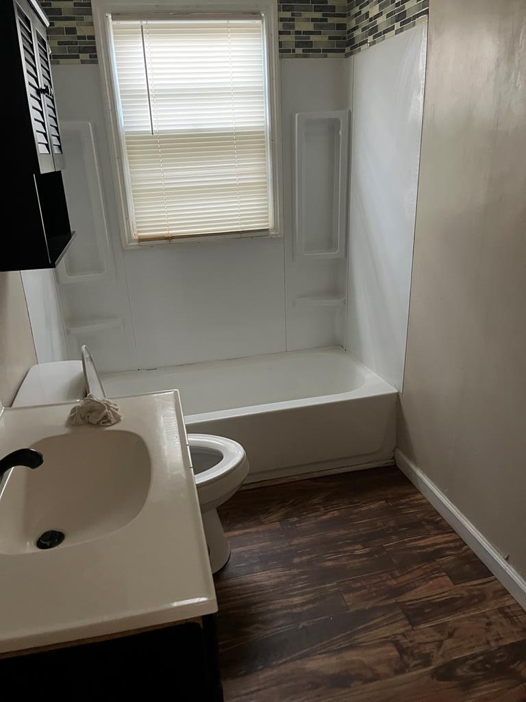 200 Hunt Circle, Unit 200 Manchester, GA 31816 - Photo 7 of 14 a bathroom with a sink and a bathtub